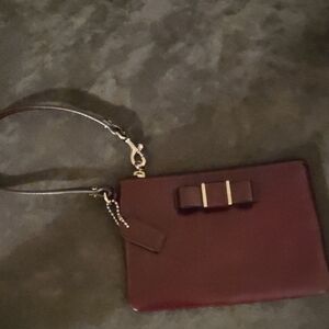 Coach Maroon Wristlet with Bow Detail